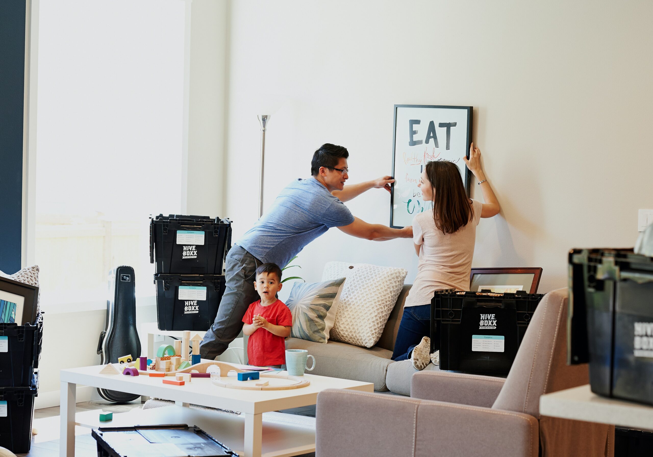 image of a family moving furniture.